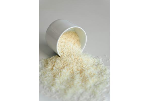 Rice water for dandruff natural scalp remedy in glass bottle