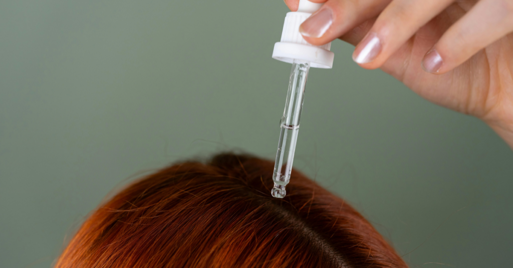 Applying Castor Oil and Olive Oil Treatment on Hair