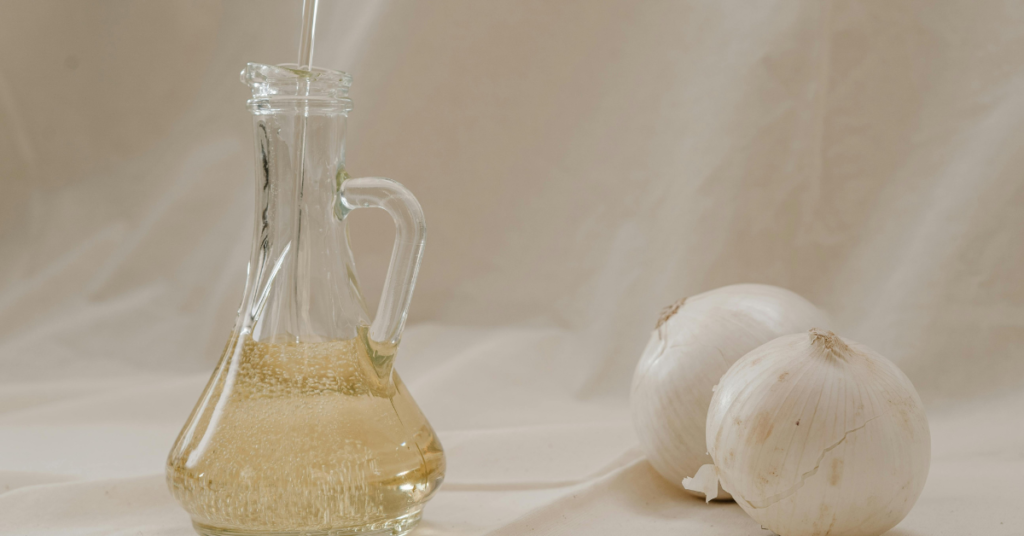 Castor oil and onion juice ingredients for a hair growth remedy