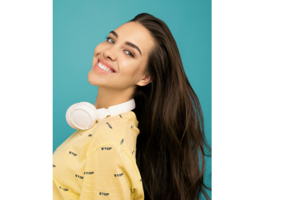 Woman applying natural oil treatment for healthy hair growth
