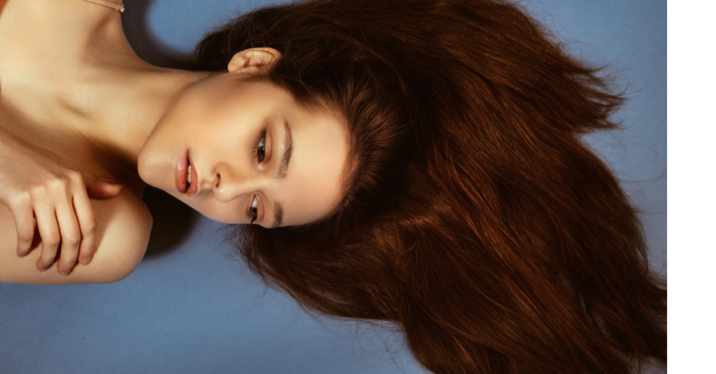 Healthy long shiny hair after using rosemary oil regularly